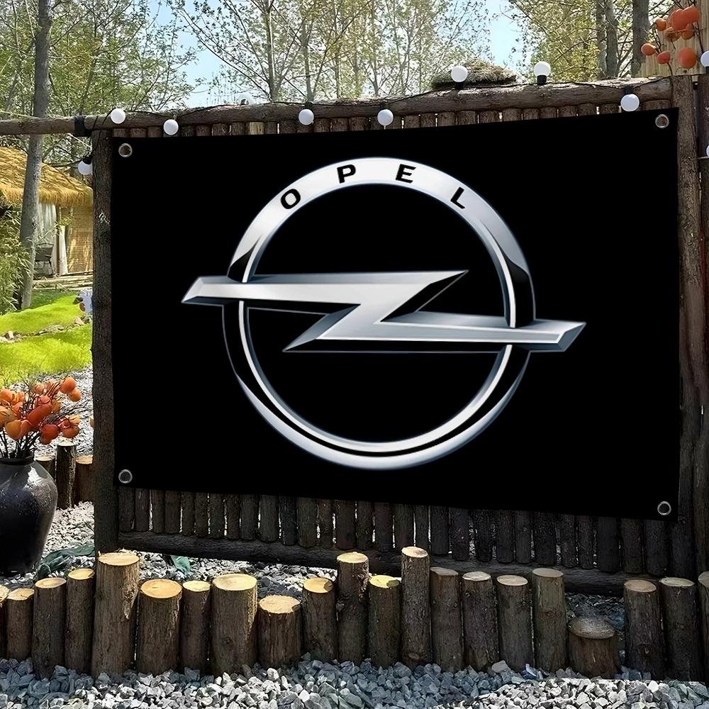 Flaga z metalowym logo O-Opels – Outdoor Sport Background recenzja i cena